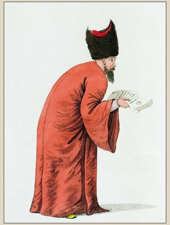 An Ottoman dragoman in robe and fur hat, reading a scroll — period costume plate